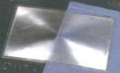 עדשת פרנל שקופות ועדשת פרנל המודבקת על מראה מישורית